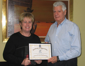 Judy Landau presents Jack Morgan with Certificate of Appreciation from VAJEX